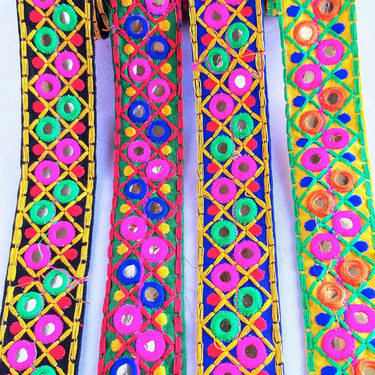 Black Cotton Fabric Mirrored Trim With Embroidery In Fuchsia Pink, Green, Red & Yellow Threads